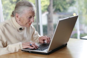 Elderly lady working on estate planning